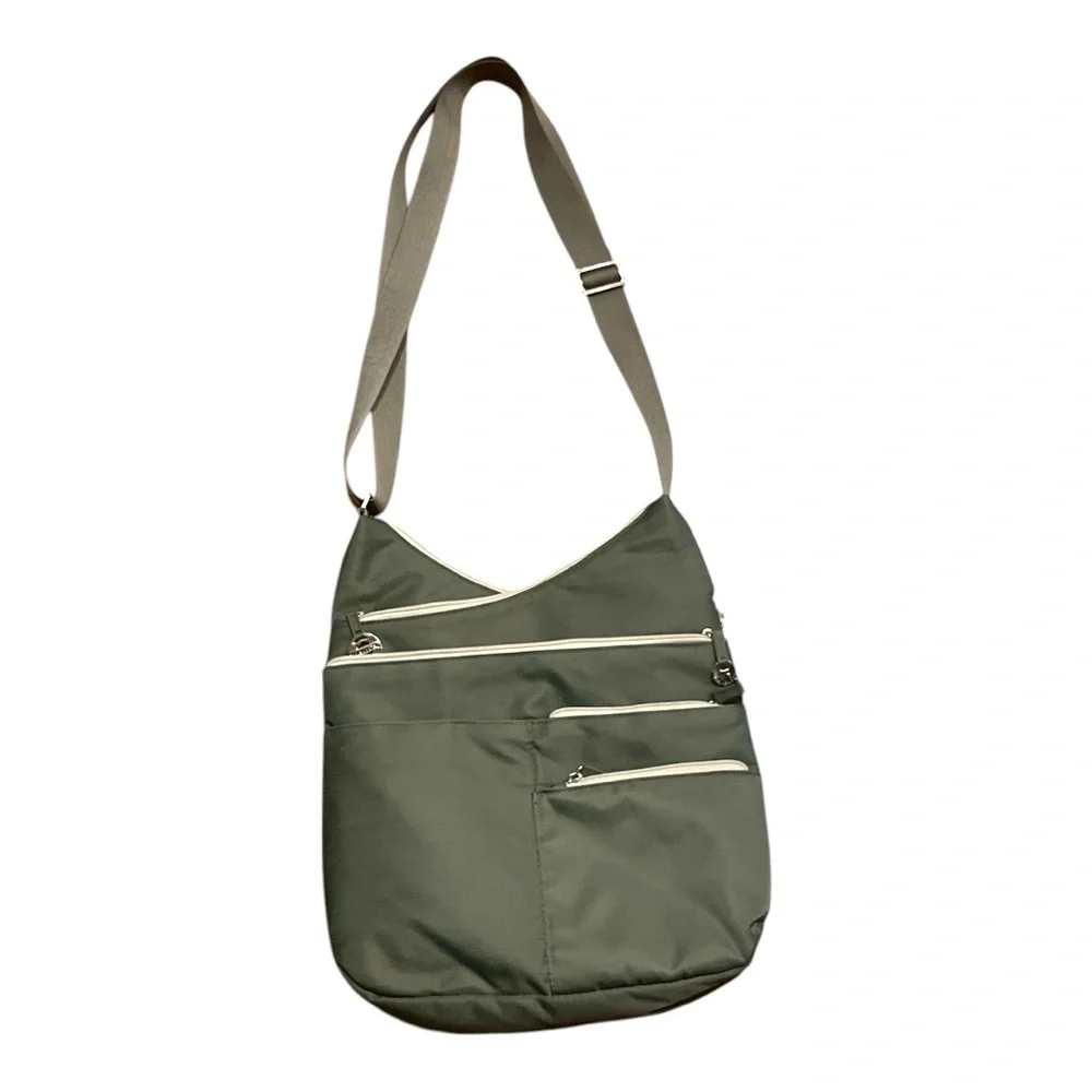 Travelon Anti-theft Crossbody Bag with 7 compartments green.
